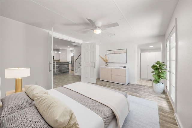 8104 Broken Branch Dr, Round Rock, TX 78681 - bedroom with light wood-style flooring, multiple windows, a ceiling fan, and recessed lighting
