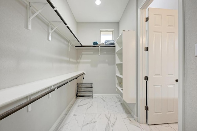 600 E Baylee Love Ln, Austin, TX 78717 - walk in closet with light marble finish flooring