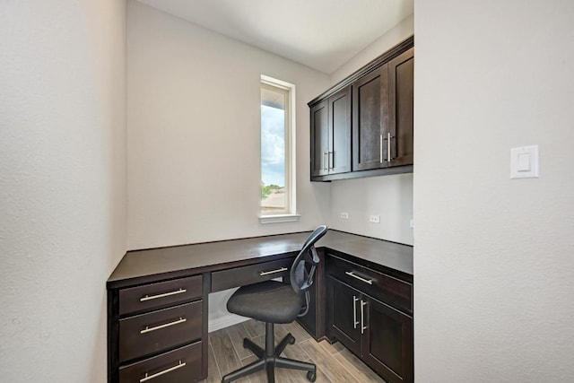 600 E Baylee Love Ln, Austin, TX 78717 - office featuring built in desk and light wood-style floors