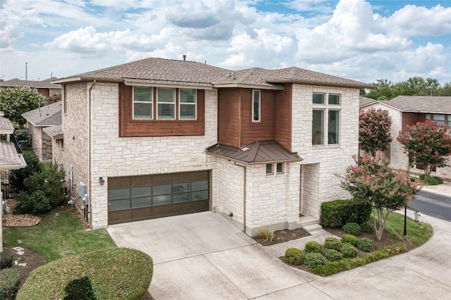600 E Baylee Love Ln, Austin, TX 78717 - view of front of house with an attached garage, concrete driveway, stone siding, and a shingled roof