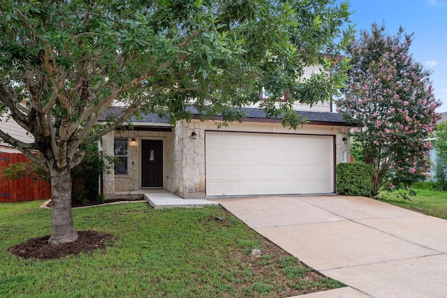 7625 Cayenne Ln, Austin, TX 78741 - view of property hidden behind natural elements with an attached garage, concrete driveway, stone siding, a front lawn, and roof with shingles