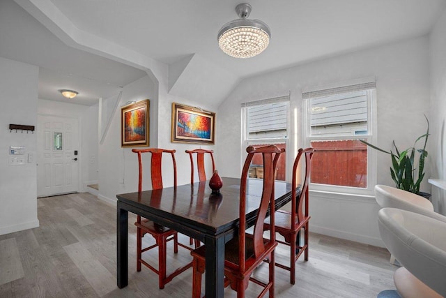 7625 Cayenne Ln, Austin, TX 78741 - dining area featuring a chandelier and light wood finished floors