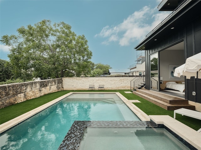 412 Kemp St, Austin, TX 78741 - view of pool with a fenced backyard and a pool with connected hot tub