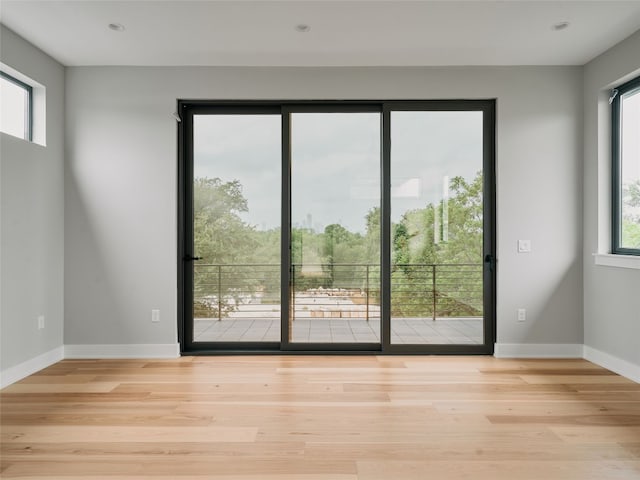 412 Kemp St, Austin, TX 78741 - unfurnished room with wood finished floors and recessed lighting