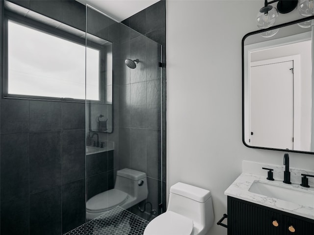 412 Kemp St, Austin, TX 78741 - bathroom featuring a tile shower and vanity