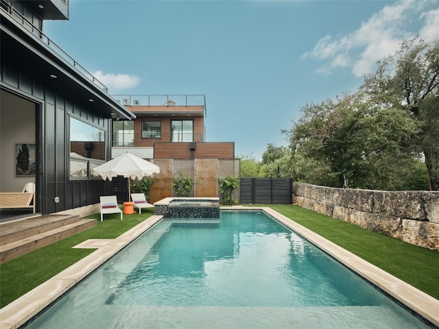 412 Kemp St, Austin, TX 78741 - view of swimming pool with a fenced backyard and a pool with connected hot tub