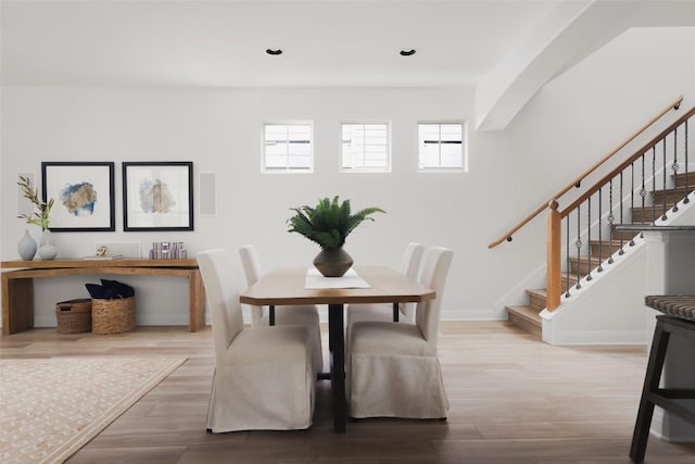 3406 Menchaca Rd Unit 14, Austin, TX 78704 - dining room featuring stairway, wood finished floors, and recessed lighting