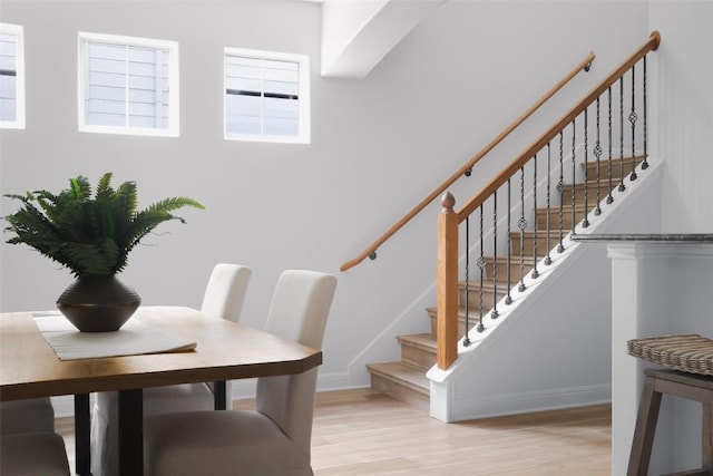 3406 Menchaca Rd Unit 14, Austin, TX 78704 - stairway with wood finished floors and baseboards