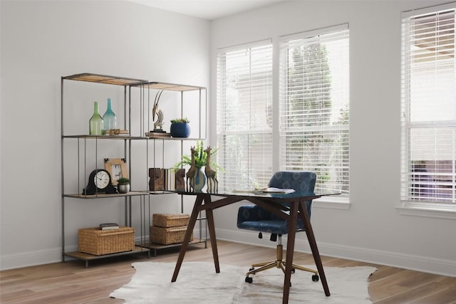 3406 Menchaca Rd Unit 14, Austin, TX 78704 - home office with plenty of natural light and wood finished floors