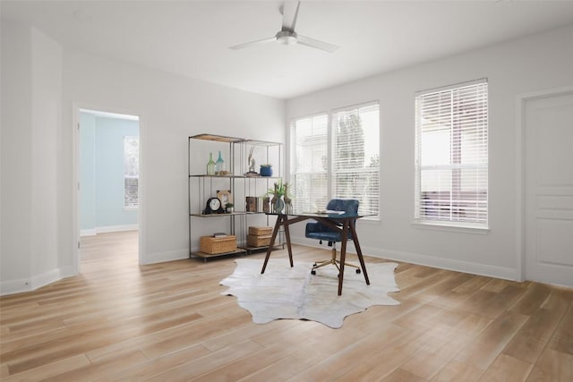 3406 Menchaca Rd Unit 14, Austin, TX 78704 - office with light wood-style floors and ceiling fan