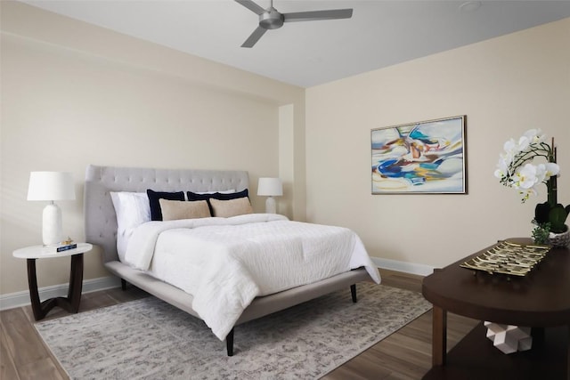 3406 Menchaca Rd Unit 14, Austin, TX 78704 - bedroom featuring wood finished floors and a ceiling fan
