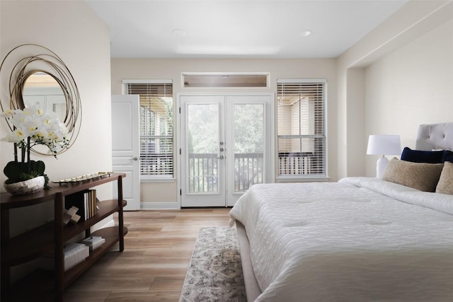 3406 Menchaca Rd Unit 14, Austin, TX 78704 - bedroom with access to outside and light wood finished floors