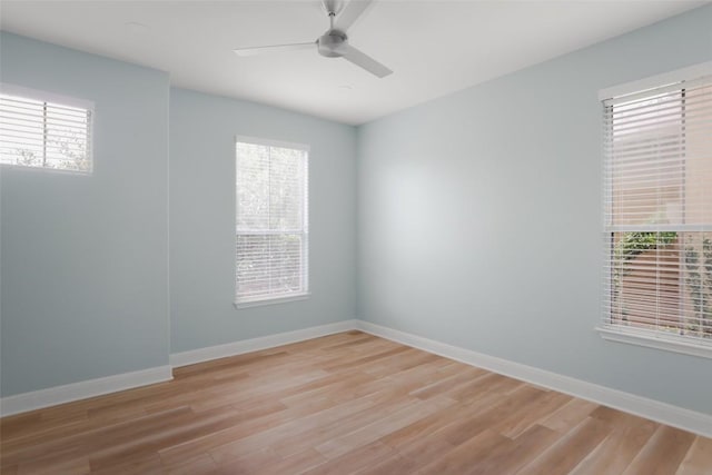 3406 Menchaca Rd Unit 14, Austin, TX 78704 - spare room with healthy amount of natural light, light wood-style flooring, and ceiling fan