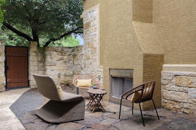 3406 Menchaca Rd Unit 14, Austin, TX 78704 - view of patio with an outdoor fireplace
