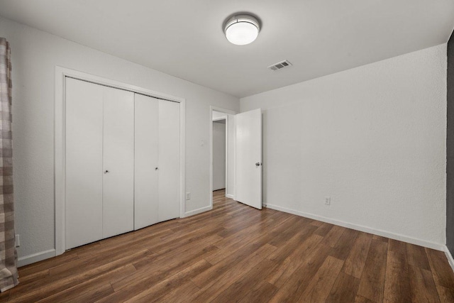 7604 Beinville Cv, Austin, TX 78749 - unfurnished bedroom featuring wood finished floors and a closet