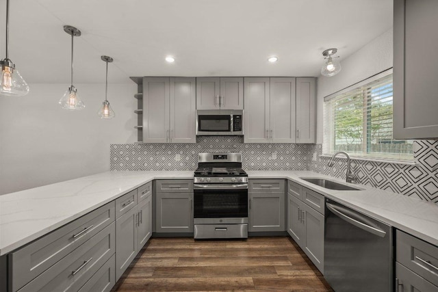 7604 Beinville Cv, Austin, TX 78749 - kitchen with stainless steel appliances, gray cabinets, open shelves, decorative backsplash, and recessed lighting