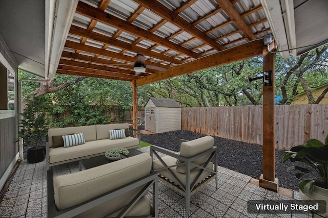 7604 Beinville Cv, Austin, TX 78749 - fenced backyard with a storage shed, a patio area, and outdoor lounge area