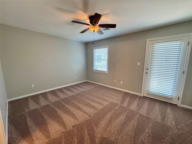 6900 E Riverside Dr Unit 8, Austin, TX 78741 - spare room with carpet flooring and a ceiling fan