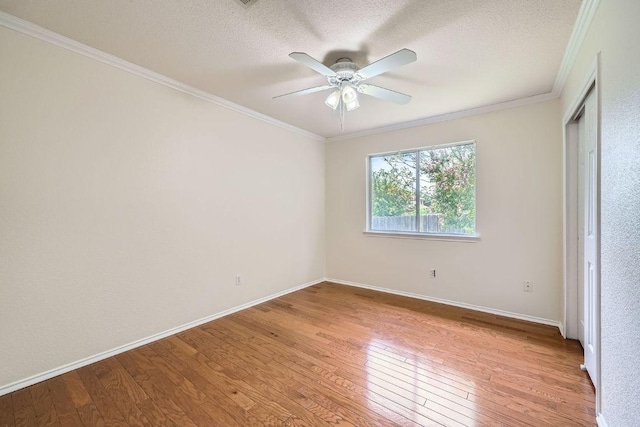 1506 Willow Bluff Dr, Pflugerville, TX 78660 - unfurnished bedroom with light wood-type flooring, crown molding, a textured ceiling, and a ceiling fan