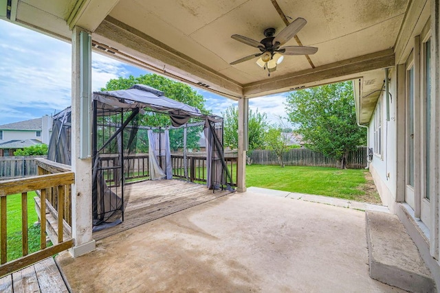 1506 Willow Bluff Dr, Pflugerville, TX 78660 - fenced backyard with a ceiling fan, a patio area, and a wooden deck
