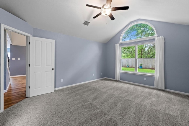 9105 Trickle Trace Trl, Round Rock, TX 78681 - spare room with carpet floors, a ceiling fan, and lofted ceiling