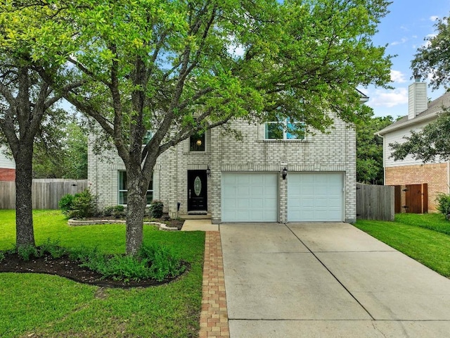 9105 Trickle Trace Trl, Round Rock, TX 78681 - view of front of property with driveway, an attached garage, and brick siding