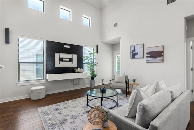 2101 Rivers Edge Way Unit 17, Austin, TX 78741 - living room with hardwood / wood-style flooring and a high ceiling