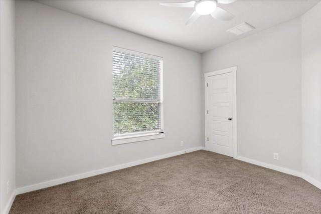 2101 Rivers Edge Way Unit 17, Austin, TX 78741 - unfurnished room featuring carpet flooring and ceiling fan