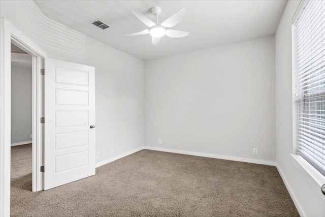 2101 Rivers Edge Way Unit 17, Austin, TX 78741 - spare room featuring carpet flooring and ceiling fan