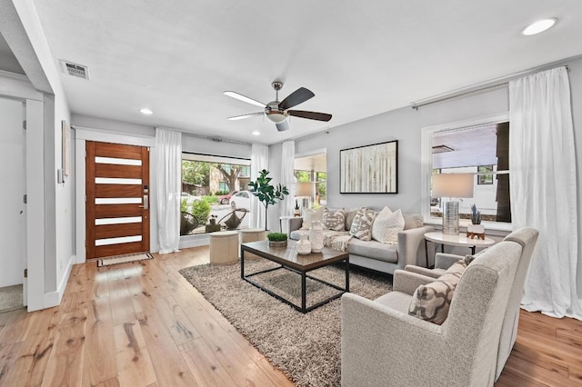 2306 Westoak Dr, Austin, TX 78704 - living area featuring light wood-style floors, ceiling fan, and recessed lighting