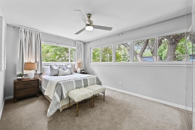 2306 Westoak Dr, Austin, TX 78704 - bedroom featuring carpet floors and a ceiling fan