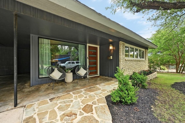 2306 Westoak Dr, Austin, TX 78704 - doorway to property with stone siding