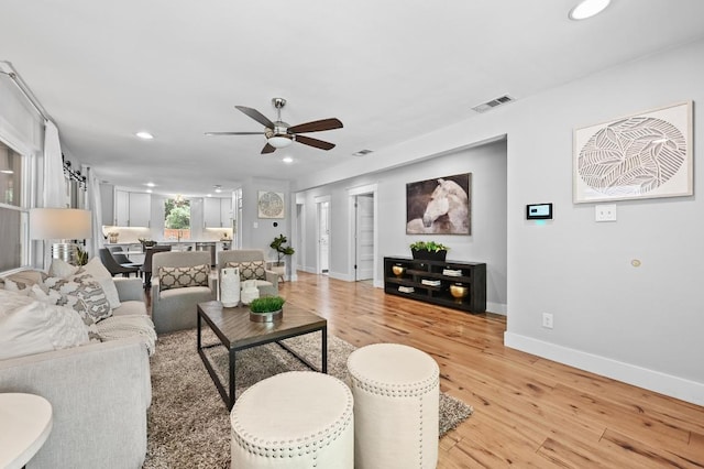 2306 Westoak Dr, Austin, TX 78704 - living room featuring ceiling fan, light wood-style floors, and recessed lighting