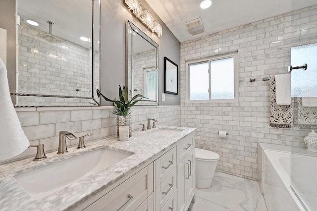 2306 Westoak Dr, Austin, TX 78704 - full bathroom featuring tile walls, double vanity, a garden tub, marble look tile flooring, and tiled shower