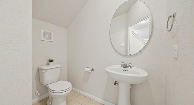 5809 Needle Nook Ct, Austin, TX 78744 - half bath with toilet and tile patterned flooring