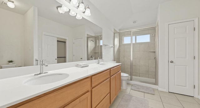 5809 Needle Nook Ct, Austin, TX 78744 - bathroom featuring tile patterned floors, a stall shower, and double vanity