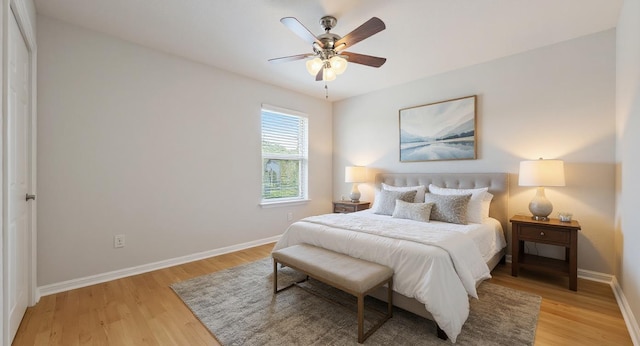 5809 Needle Nook Ct, Austin, TX 78744 - bedroom featuring light wood finished floors and a ceiling fan