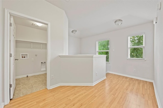 5809 Needle Nook Ct, Austin, TX 78744 - unfurnished room with light wood-style flooring