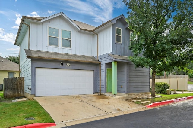 5809 Needle Nook Ct, Austin, TX 78744 - view of front facade with board and batten siding, a garage, and concrete driveway