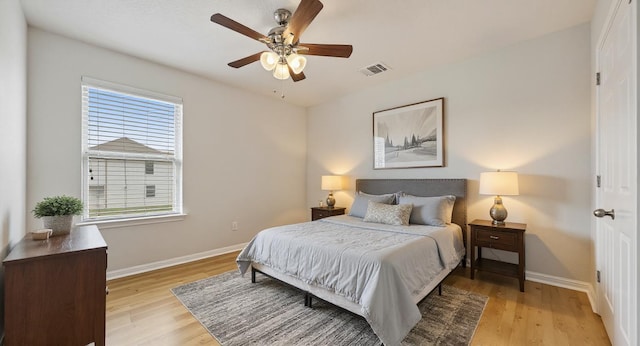 5809 Needle Nook Ct, Austin, TX 78744 - bedroom featuring light wood-style flooring and ceiling fan