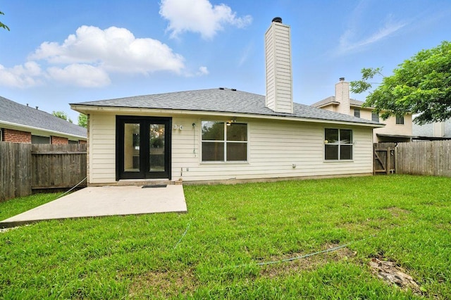 3013 Wavecrest Blvd, Austin, TX 78728 - rear view of house with a patio, a fenced backyard, french doors, and a chimney