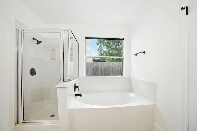 3013 Wavecrest Blvd, Austin, TX 78728 - bathroom featuring a stall shower and a garden tub