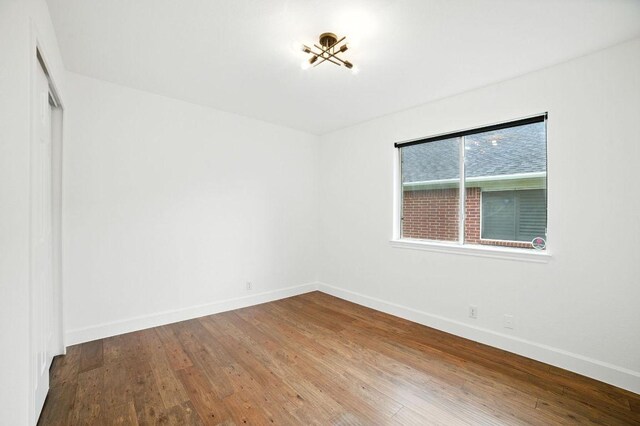 3013 Wavecrest Blvd, Austin, TX 78728 - empty room featuring baseboards and wood-type flooring