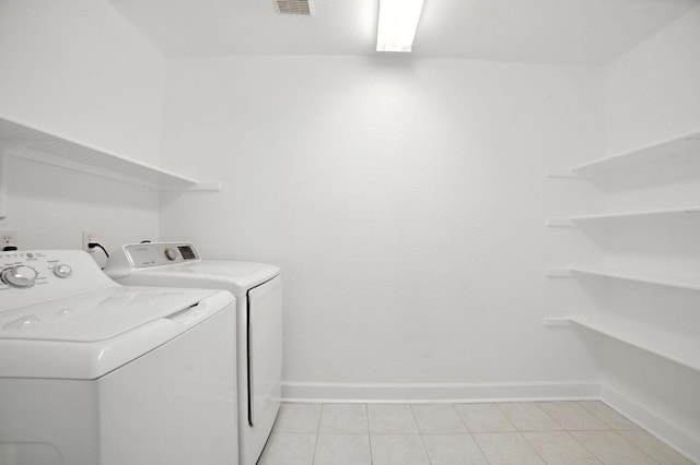 3013 Wavecrest Blvd, Austin, TX 78728 - laundry area featuring washer and clothes dryer and light tile patterned floors