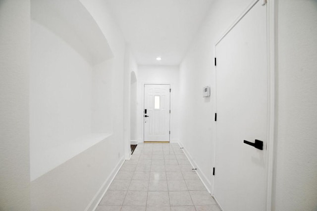 3013 Wavecrest Blvd, Austin, TX 78728 - corridor featuring arched walkways, light tile patterned floors, and recessed lighting