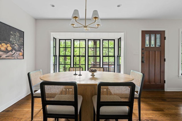 1118 Reagan Ter, Austin, TX 78704 - dining space with a chandelier and dark wood-type flooring