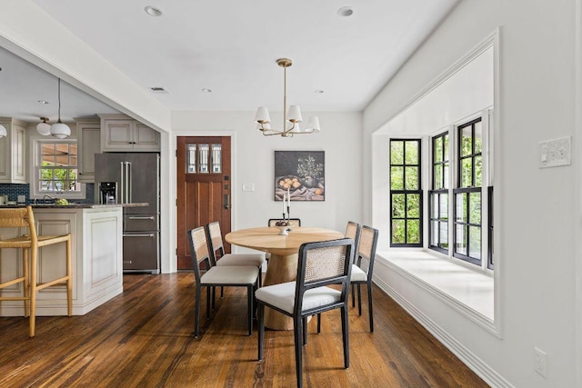 1118 Reagan Ter, Austin, TX 78704 - dining room featuring a chandelier, dark wood finished floors, and recessed lighting
