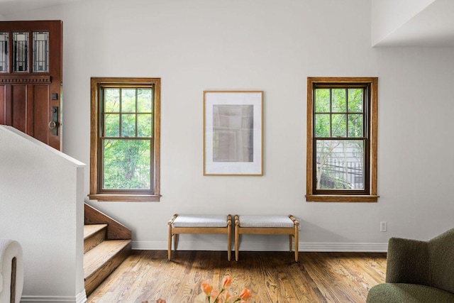 1118 Reagan Ter, Austin, TX 78704 - living area with plenty of natural light, wood finished floors, and stairway