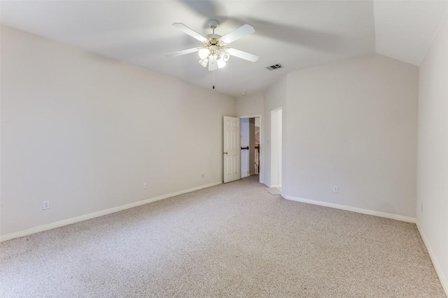 601 Indian Run Dr, Pflugerville, TX 78660 - unfurnished bedroom with light colored carpet, lofted ceiling, and a ceiling fan