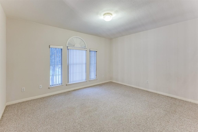 601 Indian Run Dr, Pflugerville, TX 78660 - carpeted empty room featuring baseboards